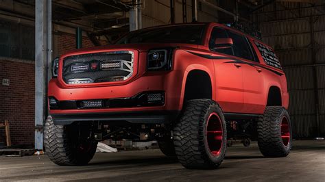 Lifted Gmc Yukon With Chrome Red Vinyl Wrap — Gallery