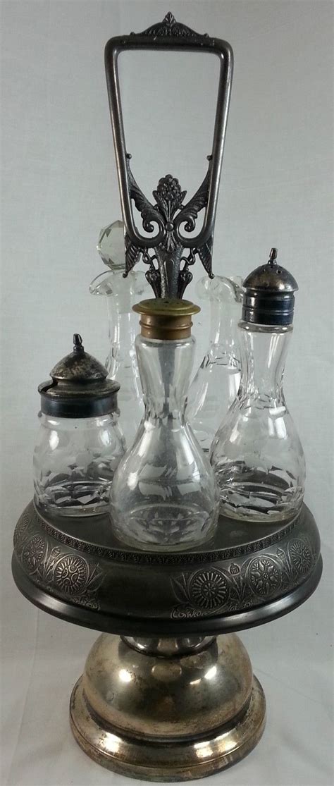 antique castor cruet set 5 etched glass bottles rogers co victorian silver antique bottles
