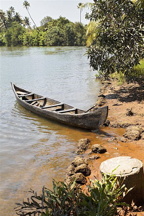 Canoe Moored On Sandy Bank Photograph By Kantilal Patel Fine Art America