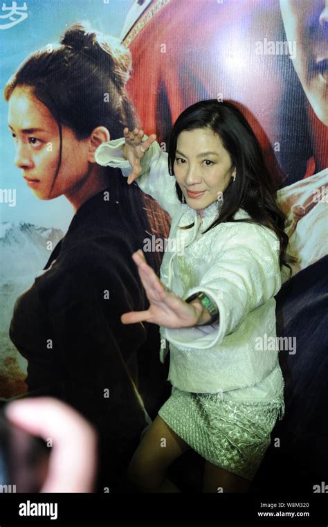Malaysian Actress Michelle Yeoh Poses During A Promotional Event For Her New Movie Crouching