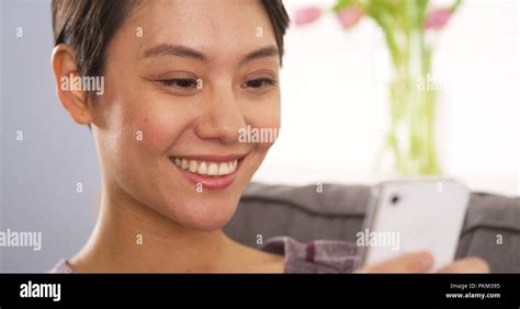 Chinese Woman Using Webcam On Smartphone Stock Photo Alamy