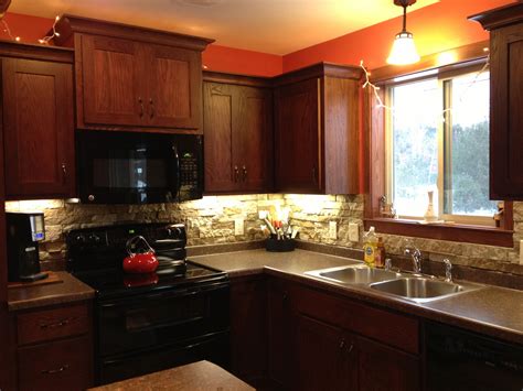 Simple backsplashes for kitchens, and titled: Our kitchen backsplash...done with airstone from Lowe's ...