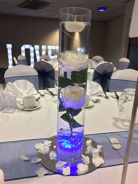 Tall Cylinder Vase Centrepiece With White Roses Submerged In Water Led
