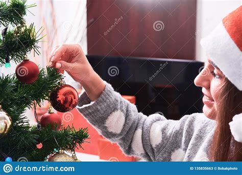 Woman Decorating Christmas Tree Stock Image Image Of Home December