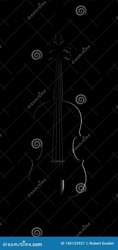 A Violin Is Seen In Striking And Unusual Lighting In This Image Stock