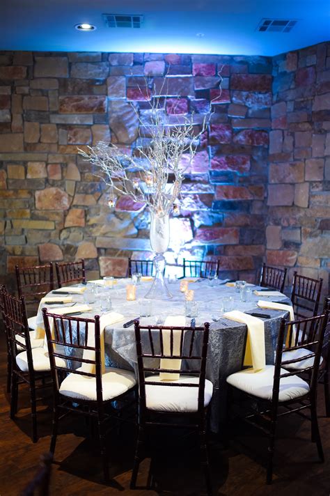 Tall Centerpiece With Silver Branches | Tall centerpieces, Centerpieces, Flower centerpieces wedding