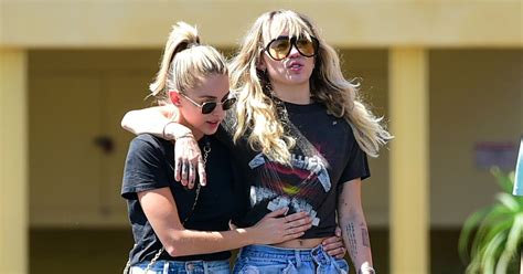 Miley Cyrus And Girlfriend Kaitlynn Carter Look Loved Up In Matching Outfits Mirror Online