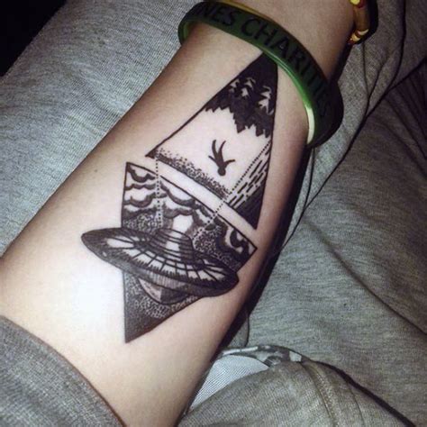 original combined black ink alien ship with human tattoo on arm tattooimages