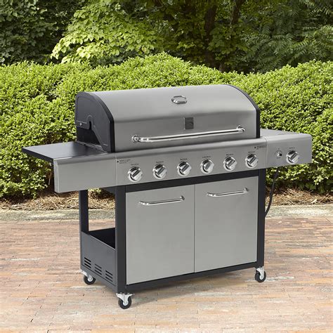 It has a temperature gauge for easy adjustment of cooking temperature, as well as a bottle opener, for added convenience. Kenmore 6-Burner LP Gas Grill with Side Burner - Black ...