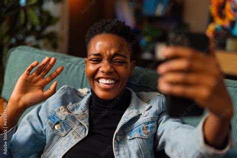 Happy Delighted Afro American Dark Skinned Holding Cell Phone