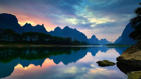 China Yangshuo Guangxi Lijiang River Mountains Water Reflection