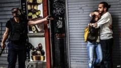 Turkish Police Tear Gas Protesters On Taksim Anniversary Bbc News