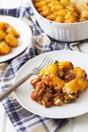 Sliced hot dogs, chili, tater tots, and cheddar cheese combine to make an easy and delicious meal. Chili Dog Tater Tot Casserole | Countryside Cravings