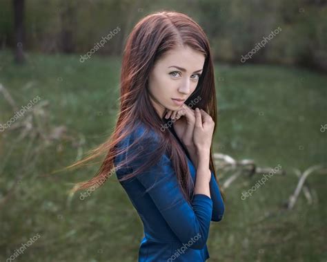 dramatic portrait of a girl theme portrait of a beautiful single girl in the woods — stock