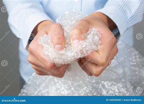 Female Hands Popping The Bubbles Of Bubble Wrap Stress Relief Anger