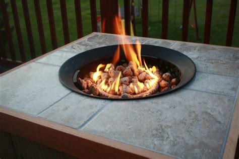 A fire pit is a great way to enjoy time outside. Dress Up Your Deck With A DIY Gas Fire Pit - Modernize