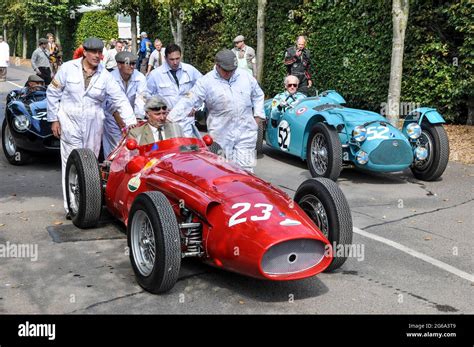 Maserati 250f Of Willi Balz Classic Vintage Racing Car Pushing Out For
