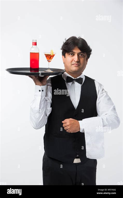 Asian Indian Waiter Or Bartender Isolated Over White Background