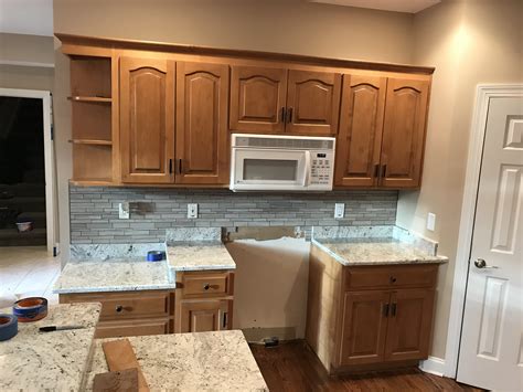 Maple is not at all difficult to refinish because it takes well to sanding, and staining or painting. Maple Cabinets Refinished to a Custom White | Complete ...