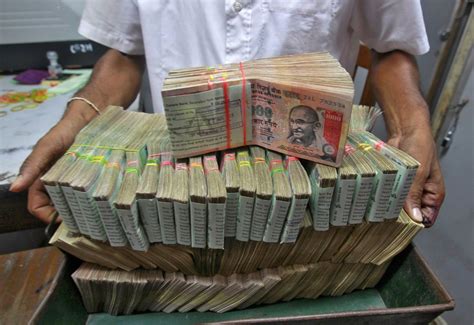 Indian Rupee Recovers Marginally After Falling To Week Low Over Rate