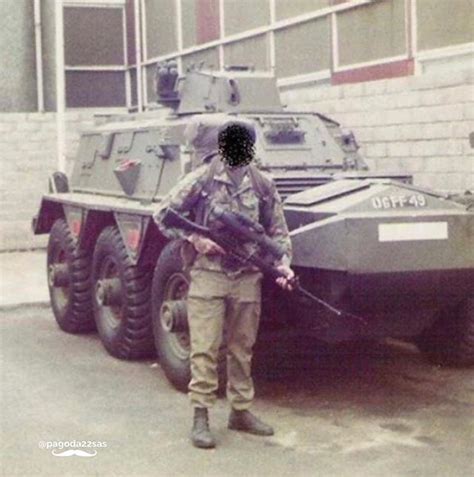 An Sas Trooper Poses In Front Of An Armoured Vehicle In Northern