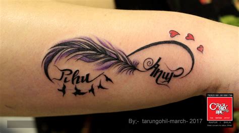 Check spelling or type a new query. infinity feather tattoo with name on wrist done at ...