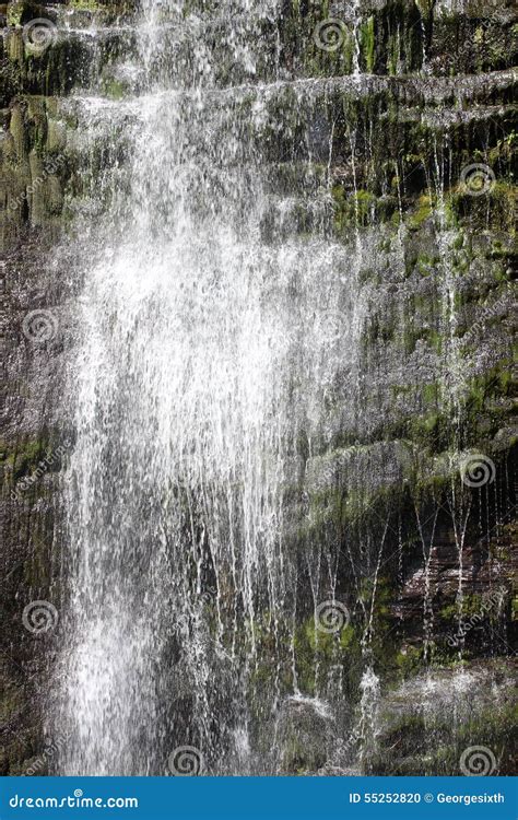 Close Up Of Water Cascading Down A Waterfall Stock Photo Image Of