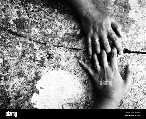 Hands Clasped Couple Black And White Stock Photos And Images Alamy