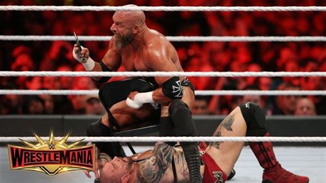 Ouch Triple H Rips Out Batistas Nose Ring With Pliers Wrestlemania