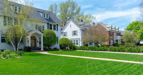 Traditional Suburban Homes With Green Front Lawns Envirospray