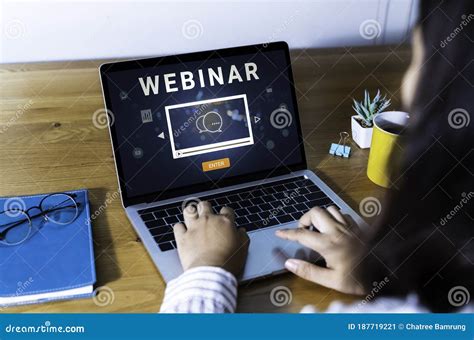 Person Using A Laptop Computer For Online Training Webinars Stock