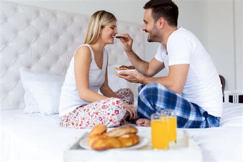 Young Attractive Couple Having Breakfast In Bed Stock Image Image Of