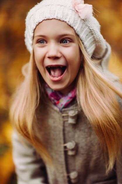 Premium Photo Charming Little Girl Laughs Happy Girl Charming Autumn