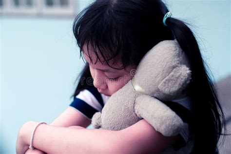Asian Sad Child Girl Hugging Teddy Bear With Love Stock Photo Image