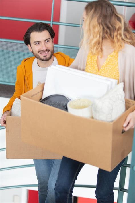 Attractive Couple Carrying Boxes Up Flight Stairs Stock Image Image