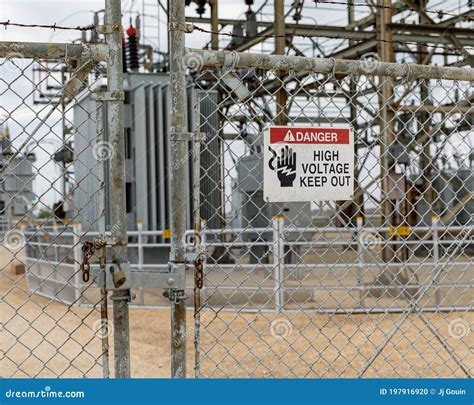 High Voltage Danger Warning Sign At Electrical Substation Stock Photo