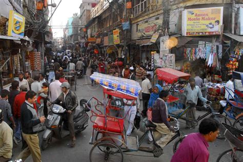 photo of busy street by photo stock source people new delhi delhi india people working