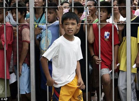 Hes Smiling Now Filipino Youths Wait In Line To Take Part In Mass Circumcision Party World