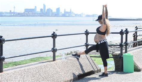Pregnant Sallie Axl Looks Ready To Pop As She Strips To Sports Bra For