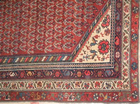 bonhams a kurdish rug west persia 205 x 125cm