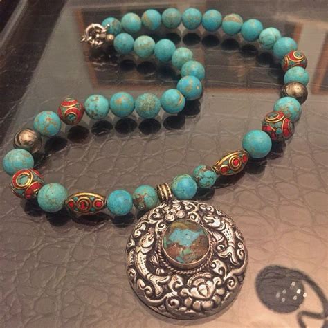 Turquoise Beaded Necklace With Pyrite And Brass Turquoise Inlaid Beads