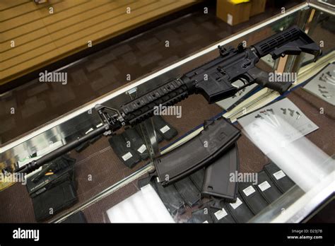 A Colt Defense M4a1 Carbine Assault Rifle On Display At A Gun Shop With