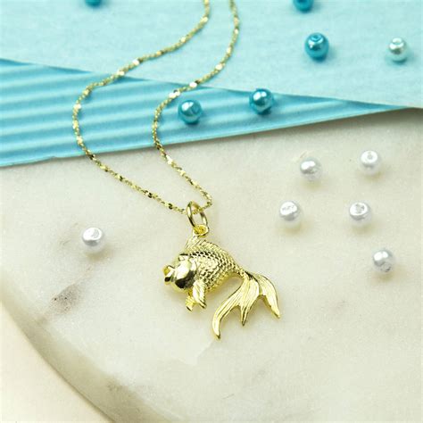 The layer of silver is very thin, so it will also wear off with time and usage. Gold Plated Sterling Silver Fish Necklace By Martha Jackson Sterling Silver | notonthehighstreet.com