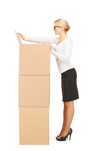 premium photo picture of attractive businesswoman with big boxes