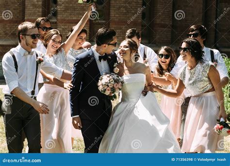 Fabulous Couple On The Wedding With Their Friends Stock Photo Image