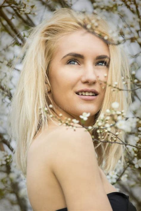Beautiful Happy Young Woman Enjoying Smell In A Flowering Spring Stock Image Image Of Enjoy