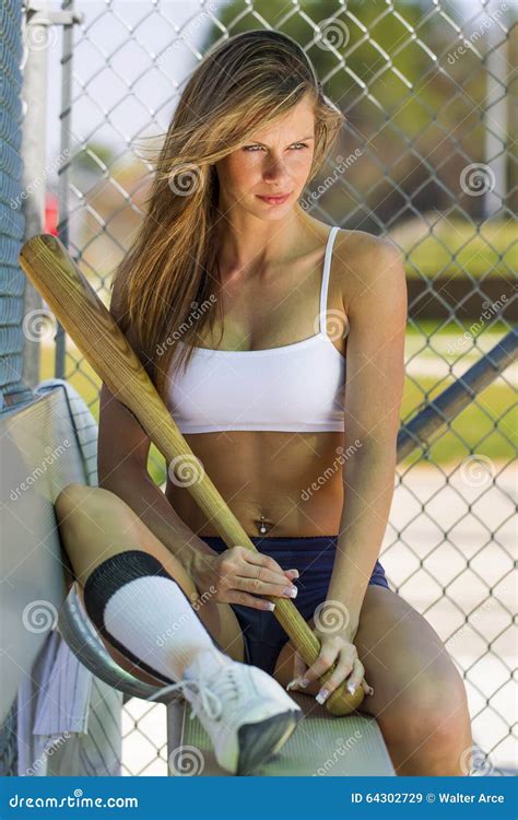 Female Athlete In A Baseball Dugout Stock Photo Image