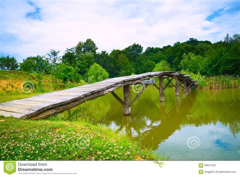 A Small Wooden Bridge Across A River Stock Image Image Of Forest