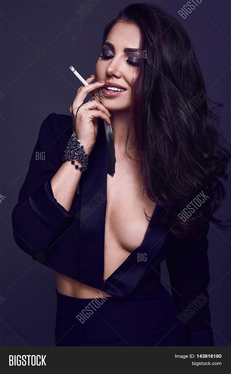 Elegant Hot Brunette Woman Smoking Image And Photo Bigstock