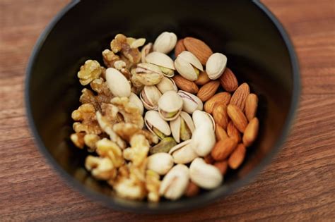 Most nuts are consumed on their own, by the handful, which can be dangerous. Nuts and Seeds | High-Calorie Foods That Are Healthy For You | POPSUGAR Fitness Photo 3